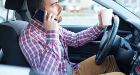 Distracted Driver on Phone, Drinking Coffee