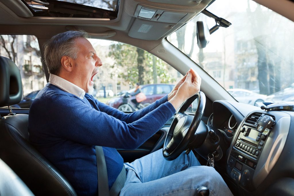 Angry White Man Yells, Enraged at the Other Driver