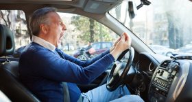 Angry White Man Yells, Enraged at the Other Driver