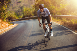 Asian men are cycling road bike in the morning.